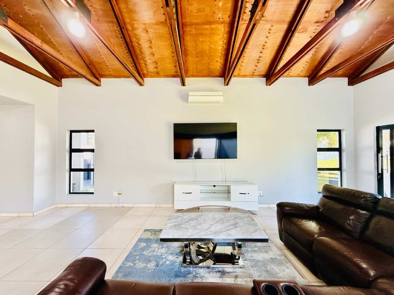 Modern Single-Level Family Home on the Green Belt in Copperleaf Golf Estate - Photo 6