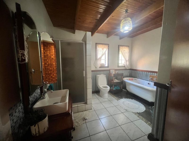 Expansive Property with Main House & Income-Generating Second Property - Photo 5