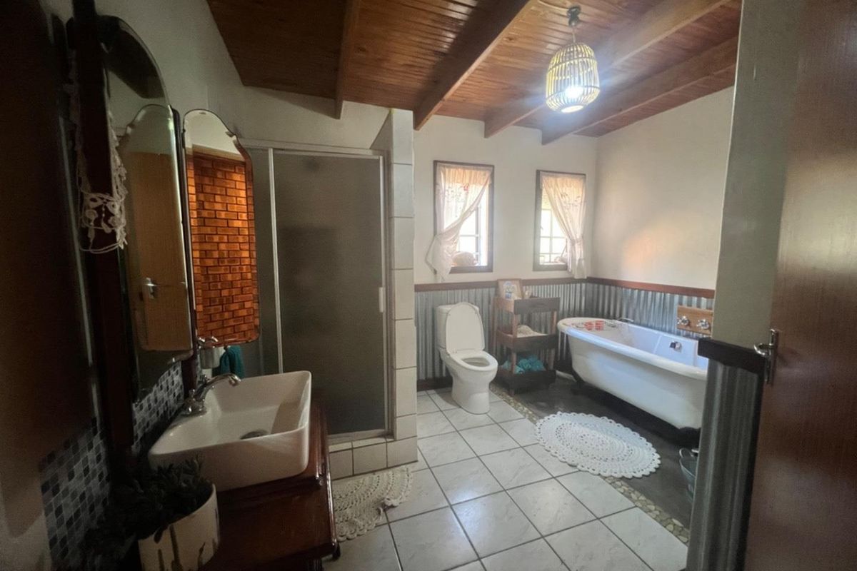 Expansive Property with Main House & Income-Generating Second Property - Photo 5