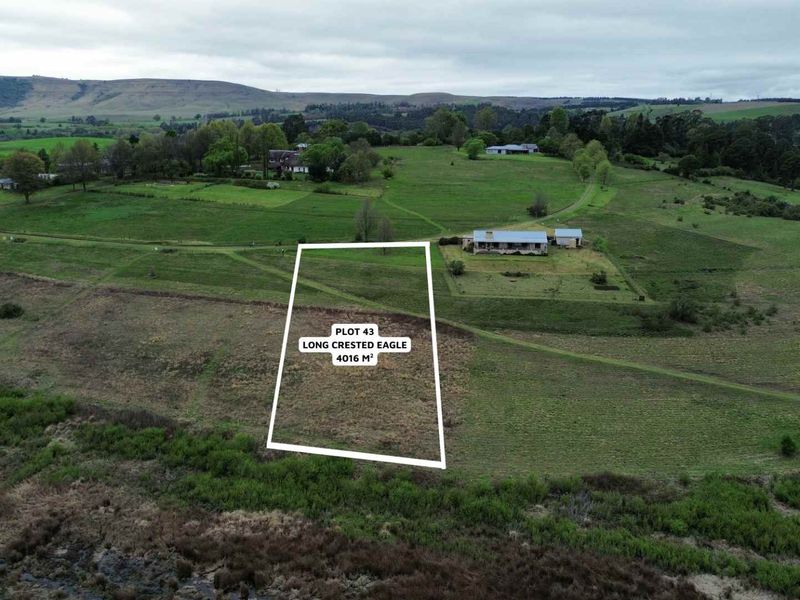 An aerial view of a 4016 square meter vacant residential plot located in a rural estate setting.