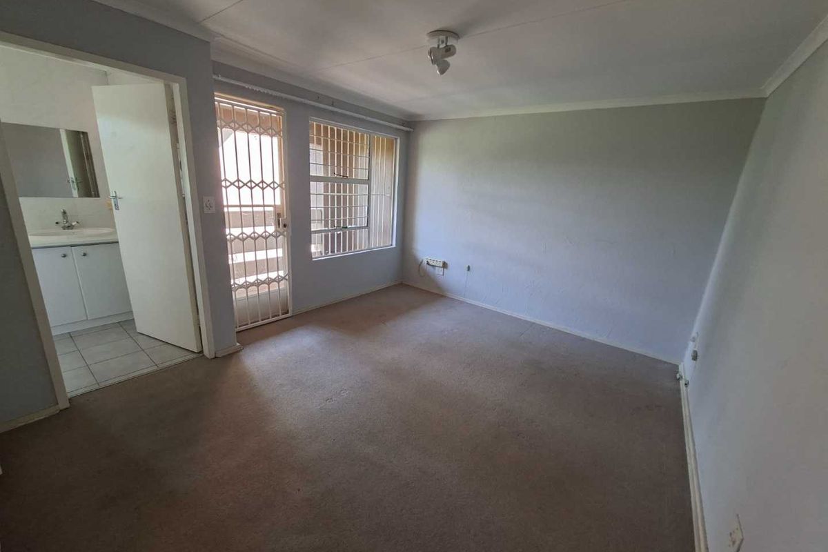 STYLISH DUPLEX IN A BOOMED OFF AREA - Photo 2