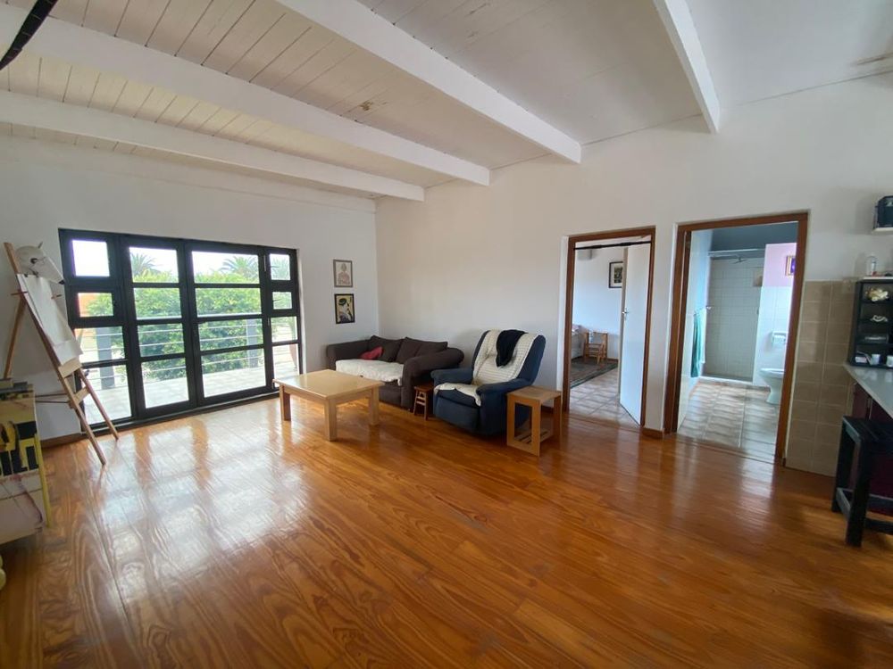 Flat one with a lounge, balcony, kitchen, bedroom and bathroom