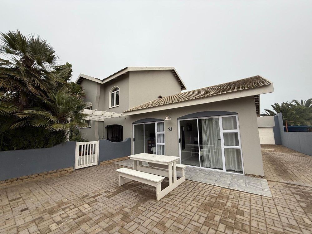 Front of house. 2 Separate en-suite rooms