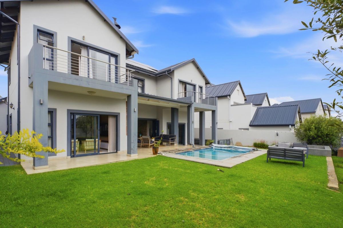 Modern Four Bedroom Home For Sale in Waterfall Country Village Estate - Photo 2