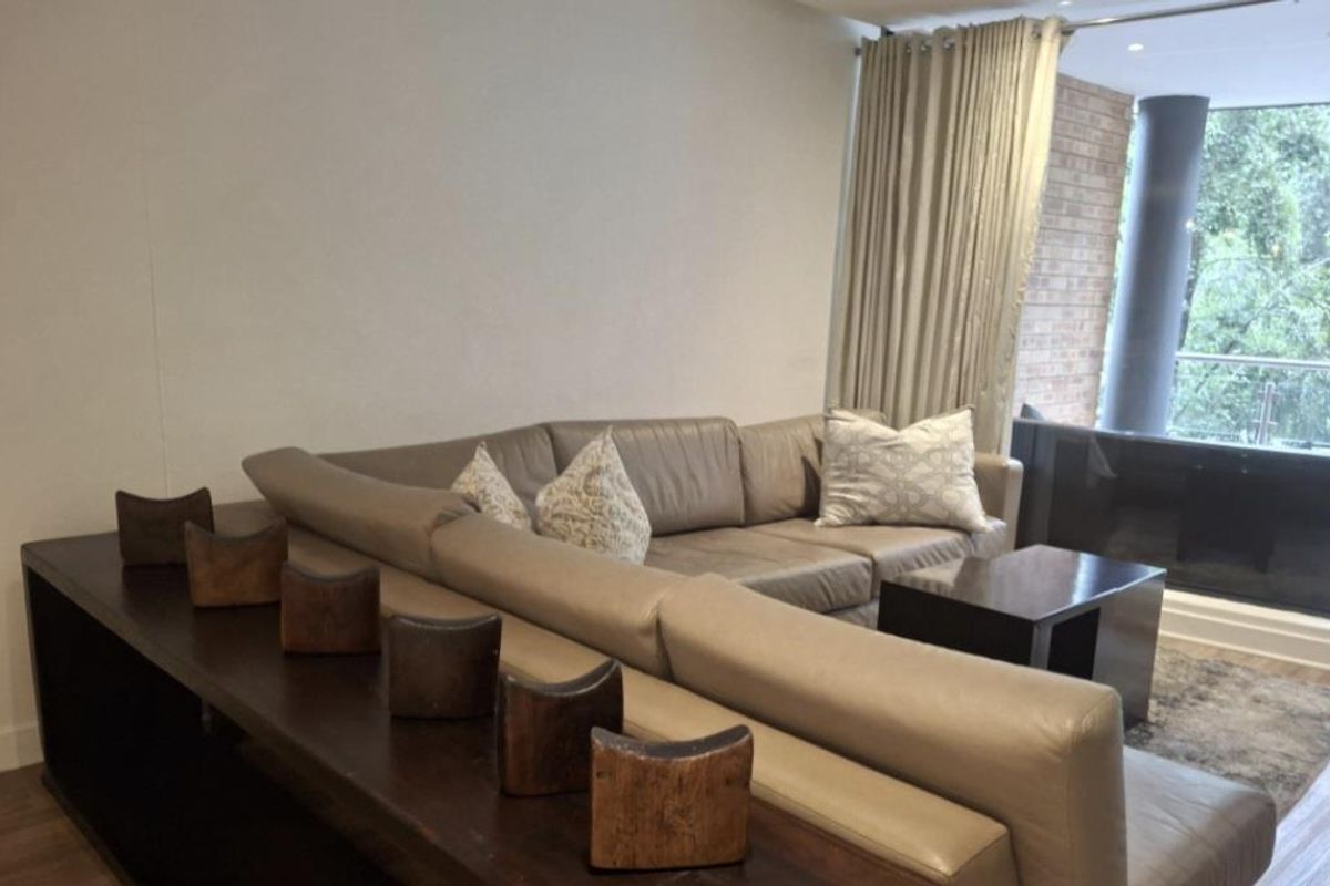 A BEAUTIFULLY FURNISHED TWO BEDROOM APARTMENT - Photo 4