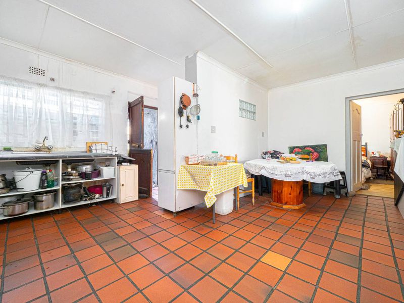 This Versatile Double-Storey property offers the perfect opportunity for renovation and customization with independent Upper and Lower Living (Homes) - Photo 9