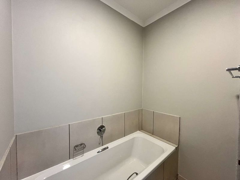 Elegant 2-Bed Apartment with Scenic Views in The Woods Estate - Photo 9