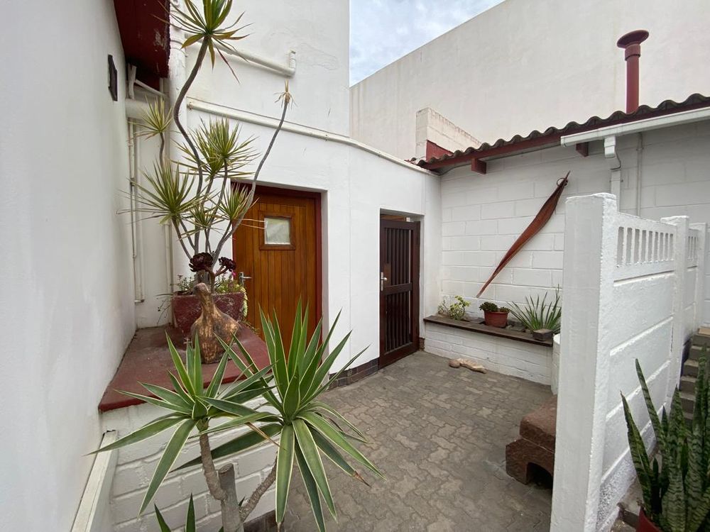 Door leading to one of the single garages
