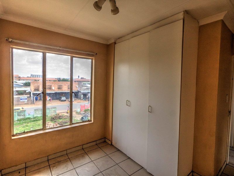 Convenient and Secure Living in a Prime Location - Photo 2