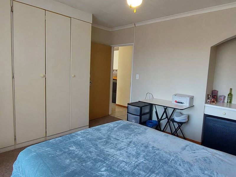 Secure Living: 2 Beds, Balcony, Carport & Storage Galore - Photo 8