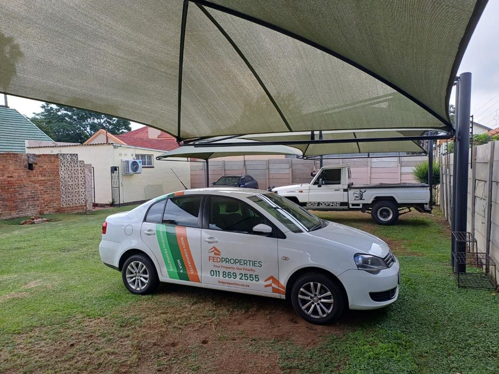 Covered Parking in back garden