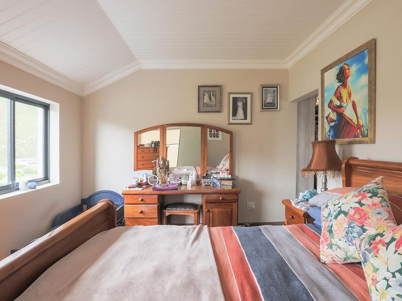 Stunning Family Home with Panoramic Mountain Views and Income-Generating Cottage - Photo 7