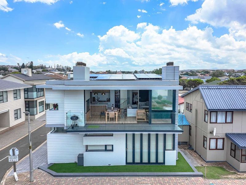 Epitome Coastal Living where Location is key - Photo 2