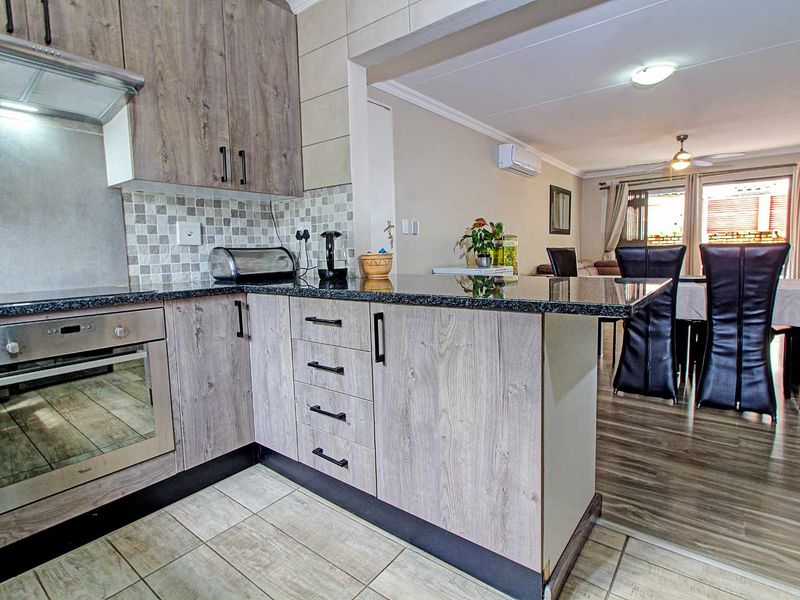 Stunning Townhouse with Solar Pool & Patio Bliss! - Photo 5