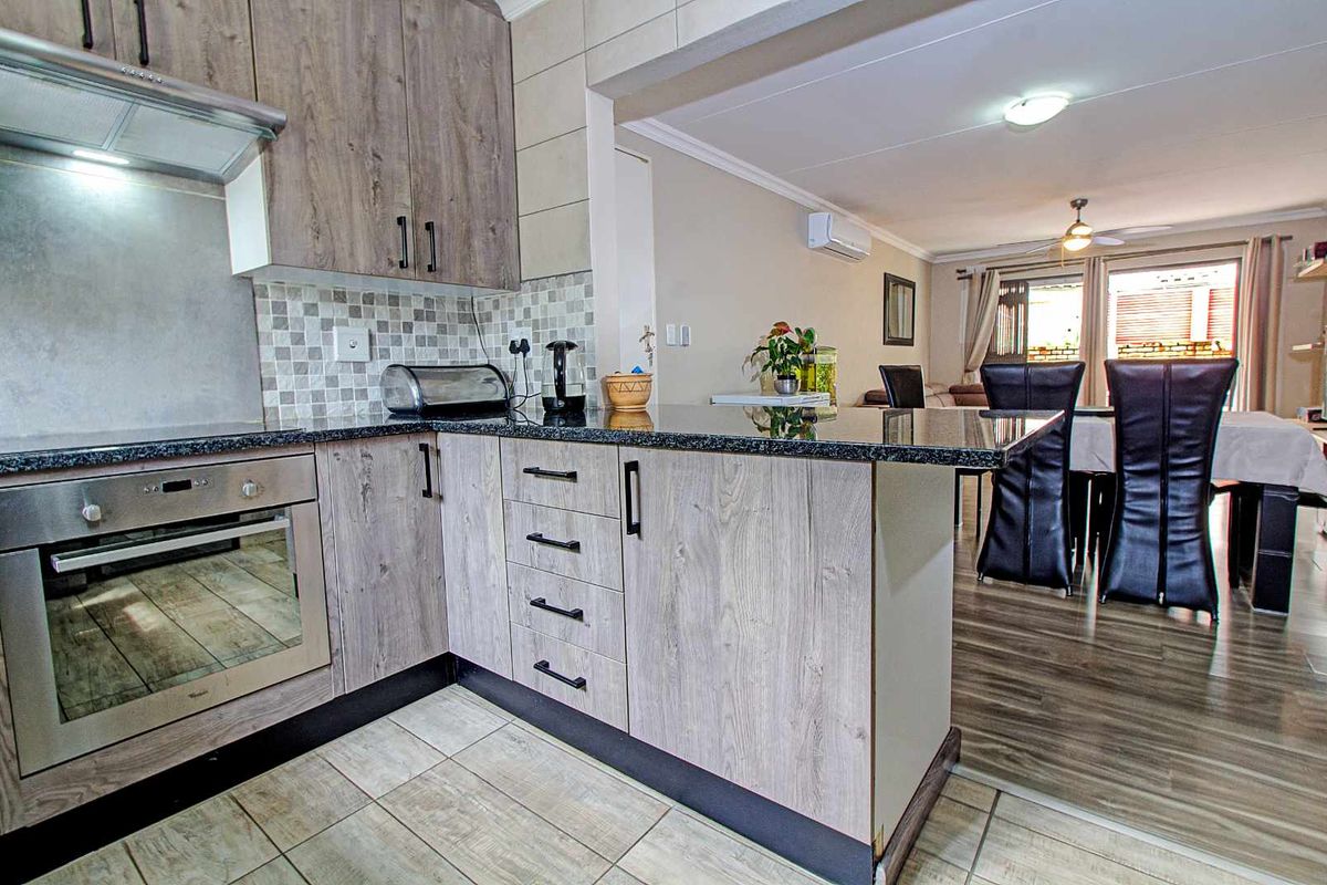 Stunning Townhouse with Solar Pool & Patio Bliss! - Photo 5