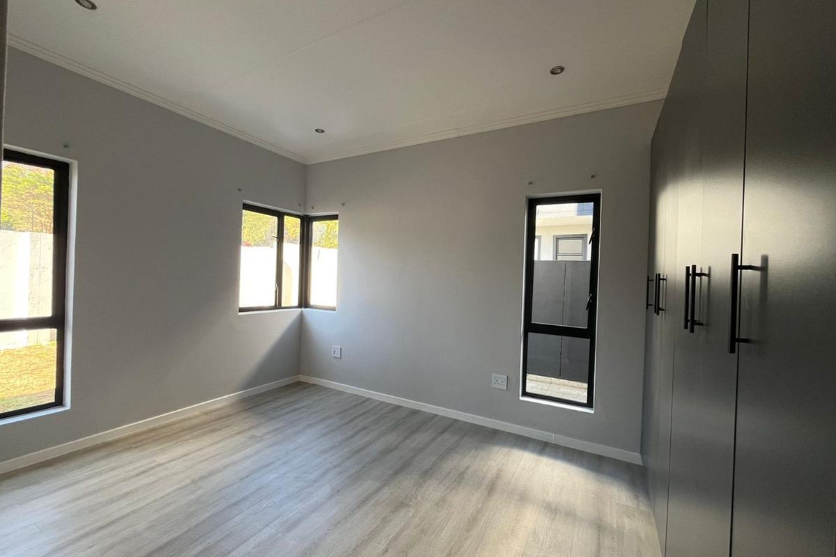 A MODERN APARTMENT IN BRYANSTON AWAITS YOU. - Photo 5