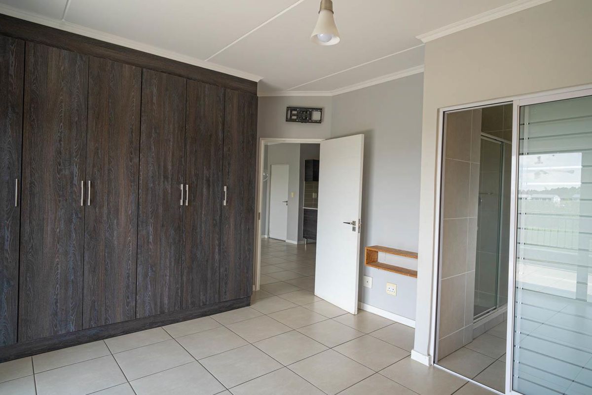 Elevated Estate Living with Tranquil Greenbelt Views - Photo 5