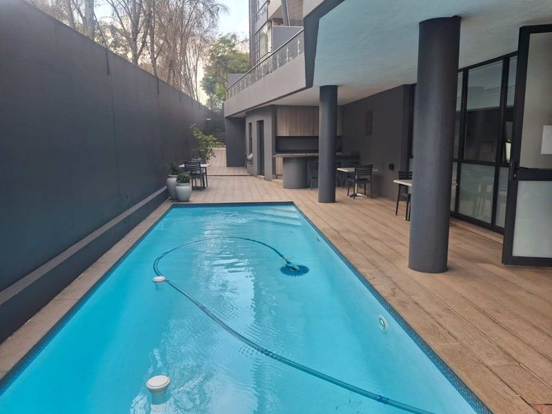 A BEAUTIFULLY FURNISHED TWO BEDROOM GARDEN APARTMENT - Photo 6