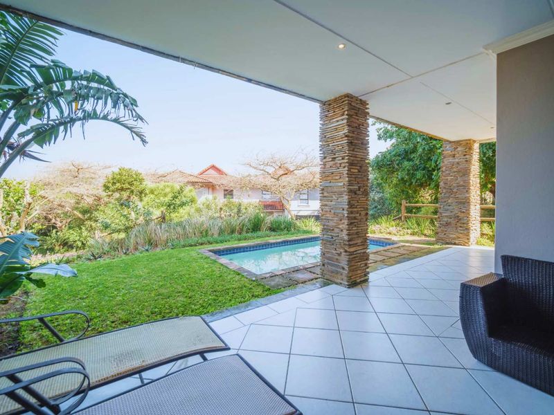 Experience exclusive coastal living in this luxurious, lock-up-and-go apartment within the prestigious Zimbali Coastal Resort. - Photo 5