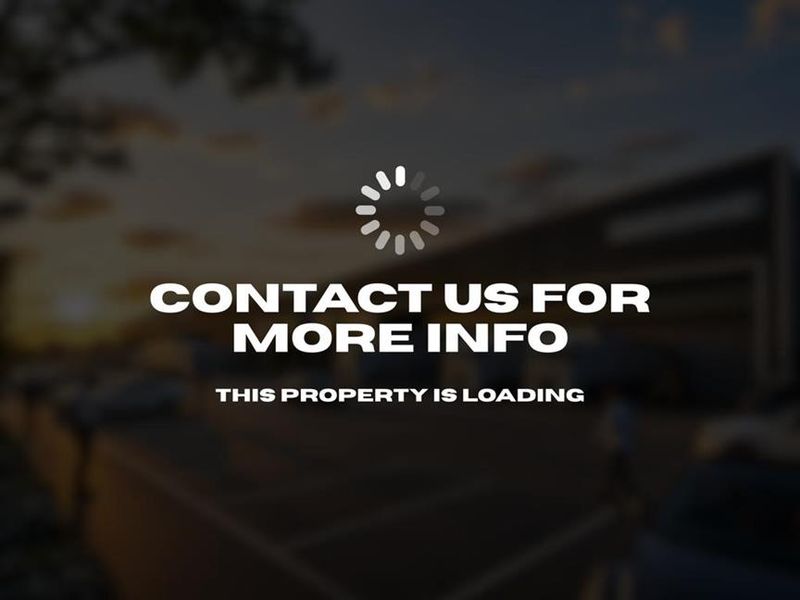 This image is a placeholder graphic containing contact information and does not display the property.