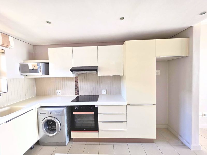 Modern 2-Bedroom Apartment with Stunning Views at Montclare Place - Photo 6