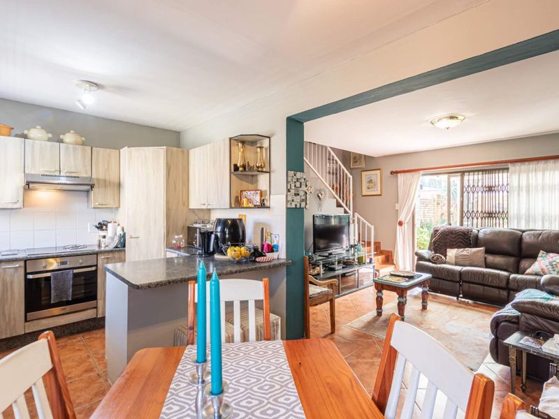 **Charming Duplex with Modern Comforts in Pristine Condition** - Photo 7