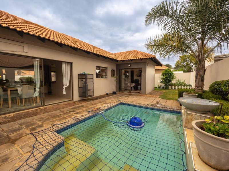 1. Charming 3-Bed Family Home with Pool in Pretoria East   2. Spacious Meadows Estate Home with Built-In Bar & Boma   3. Entertainers’ Dream: Patio, Pool & Outd - Photo 3