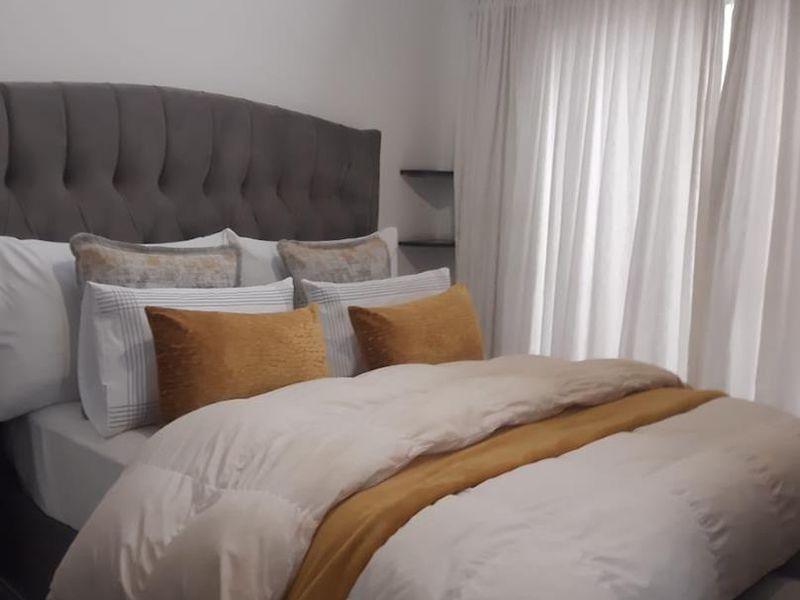 Modern 2-Bedroom Apartment in Prime Greenstone Location - Photo 10