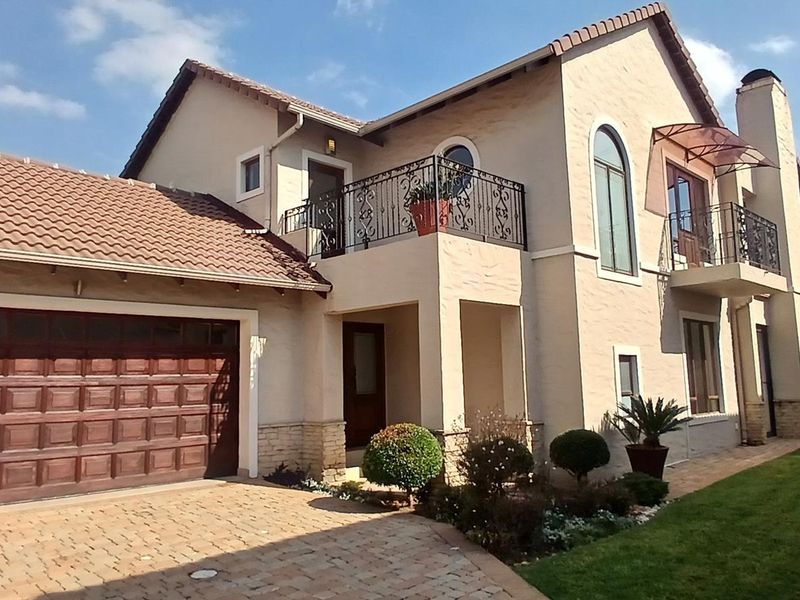 Modern Elegance in a Secure and Sought-After Estate - Photo 1