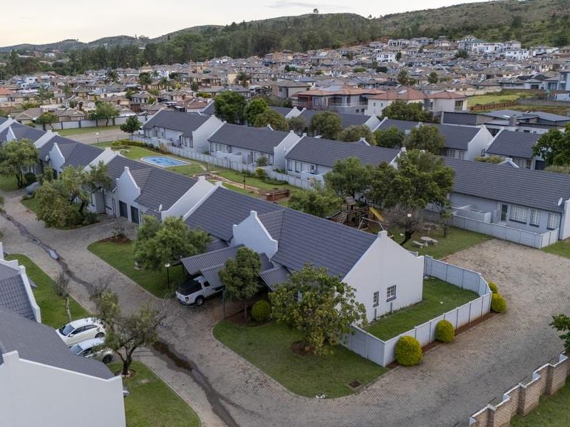 SECURE LIVING WITH POTENTIAL: 2-BEDROOM HOME WITH CHARM - Photo 3