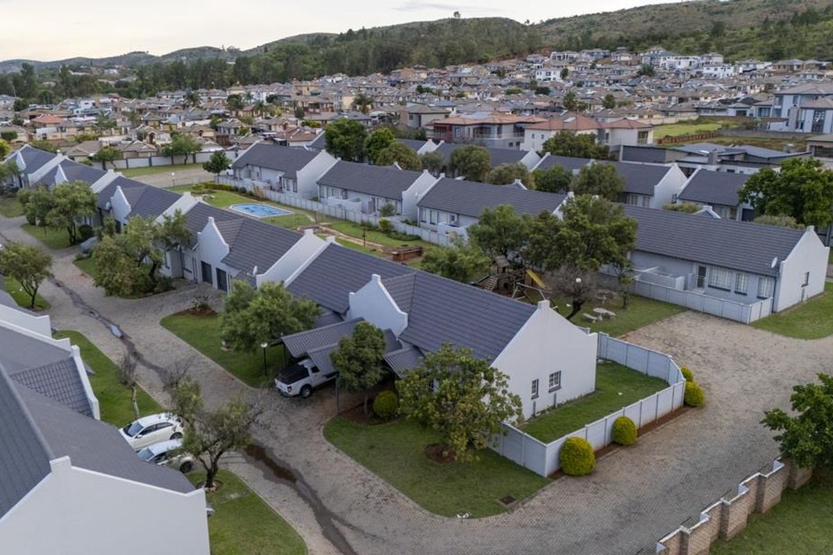 SECURE LIVING WITH POTENTIAL: 2-BEDROOM HOME WITH CHARM - Photo 3