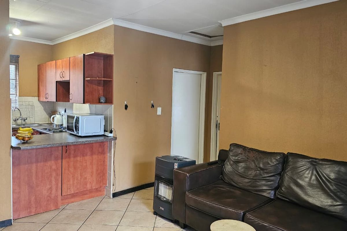 Affordable First-Floor Apartment with Balcony Braai & 24-Hour Security - Photo 4