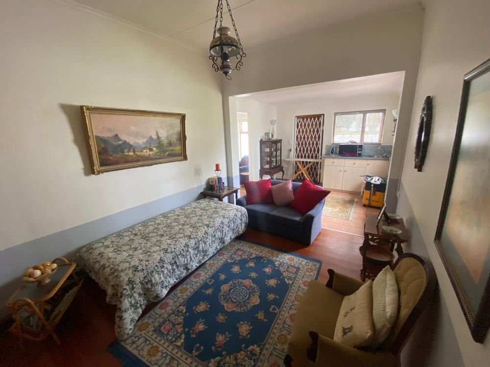 Bedroom two with a kitchenette and a small lounge