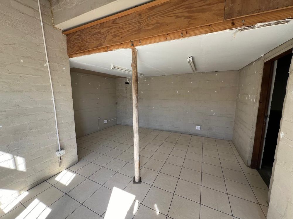 Office 1. To the left is the WC and to the right the ware house