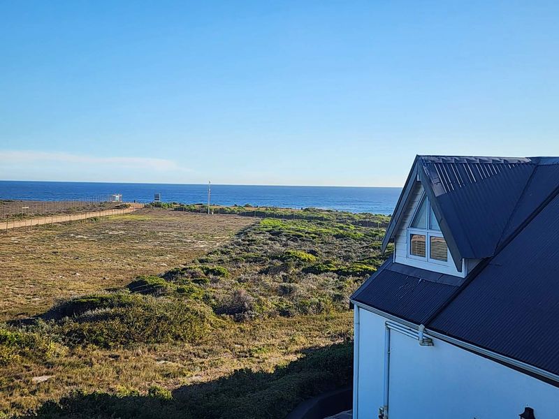 Modern Spacious Living at the Beach with Sea Views - Photo 2