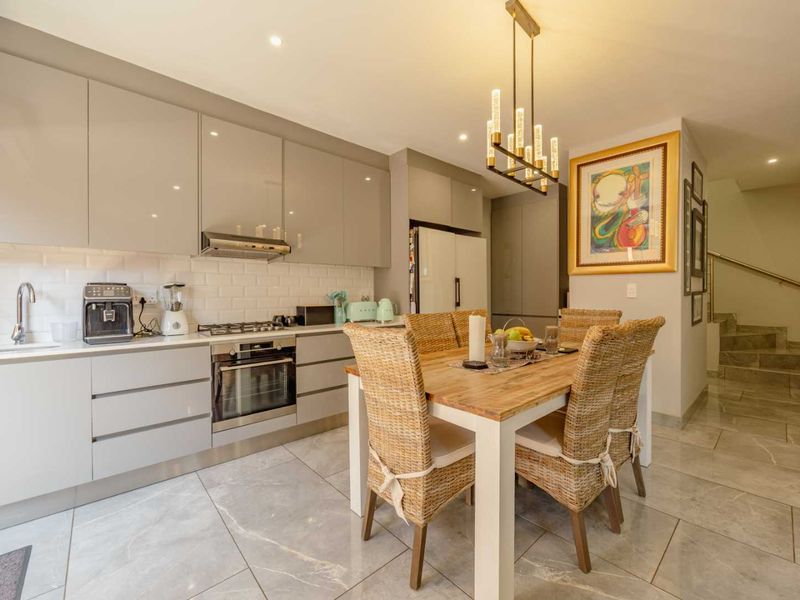 MODERN, SECURE & STYLISH LIVING – THE PERFECT LOCK-UP-AND-GO HOME** - Photo 3