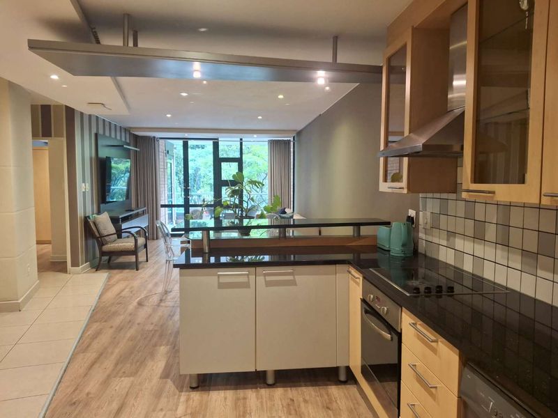 A TASTEFULLY FURNISHED TWO BEDROOM FURNISHED APARTMENT - Photo 5