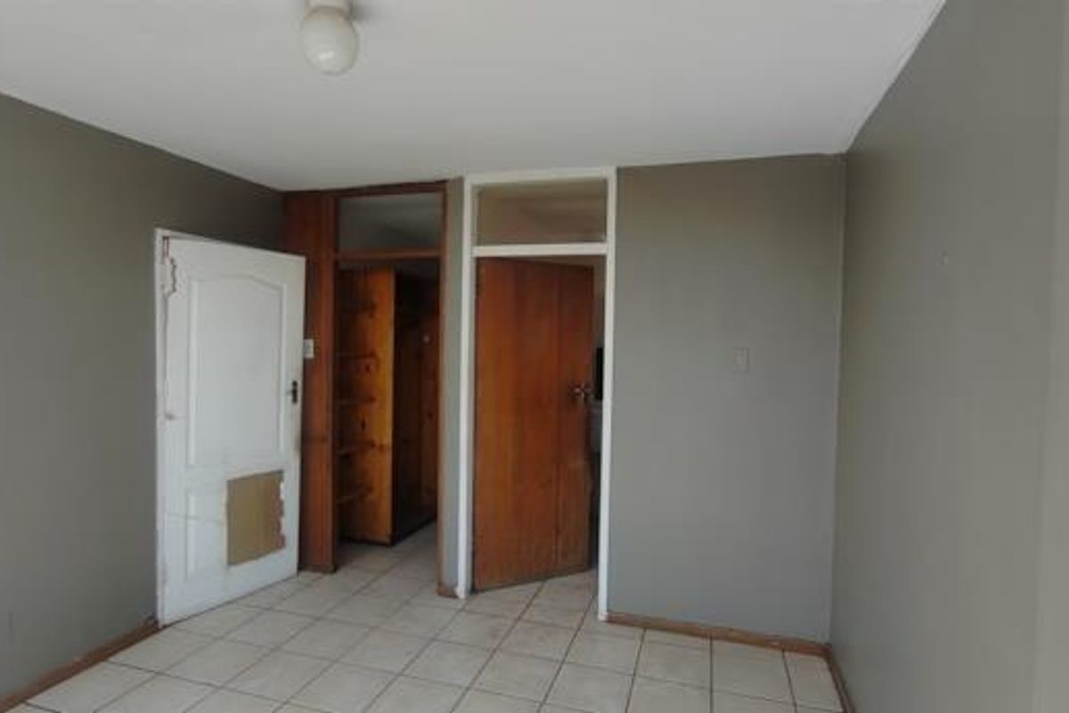 Unlock Potential in This Spacious 3-Bedroom Apartment - Photo 3