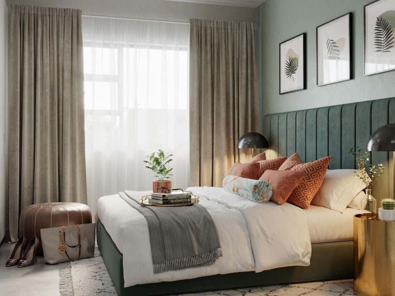 A modern, well-appointed bedroom featuring a stylish upholstered headboard, built-in wardrobe storage, and neutral finishes.