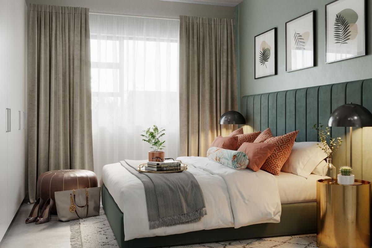 A modern, well-appointed bedroom featuring a stylish upholstered headboard, built-in wardrobe storage, and neutral finishes.
