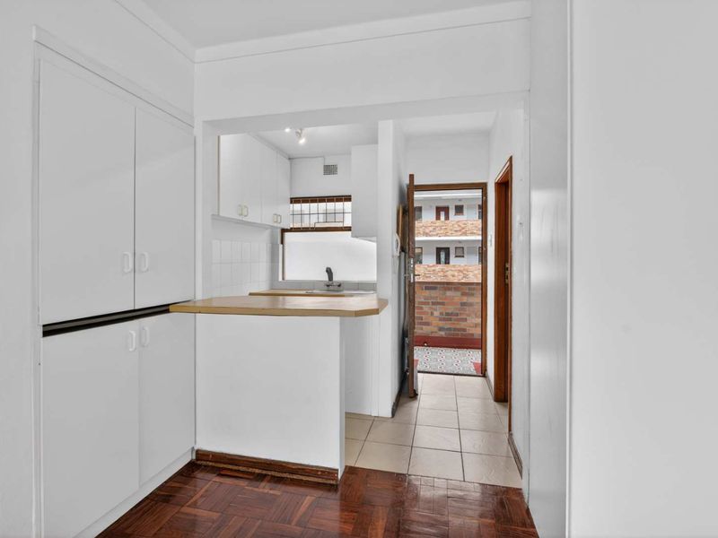 BEACHFRONT LIVING IN THE HEART OF SEA POINT - Photo 6