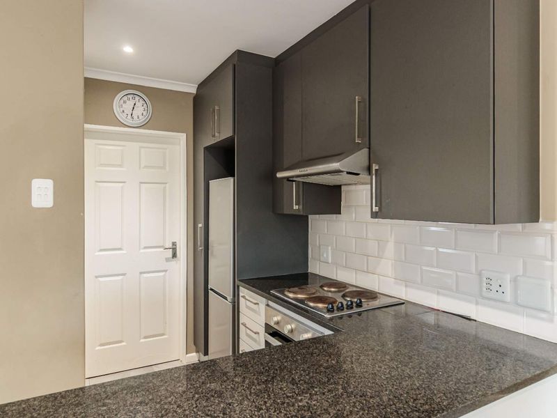 Neat & Convenient Townhouse in Secure Complex - Photo 6