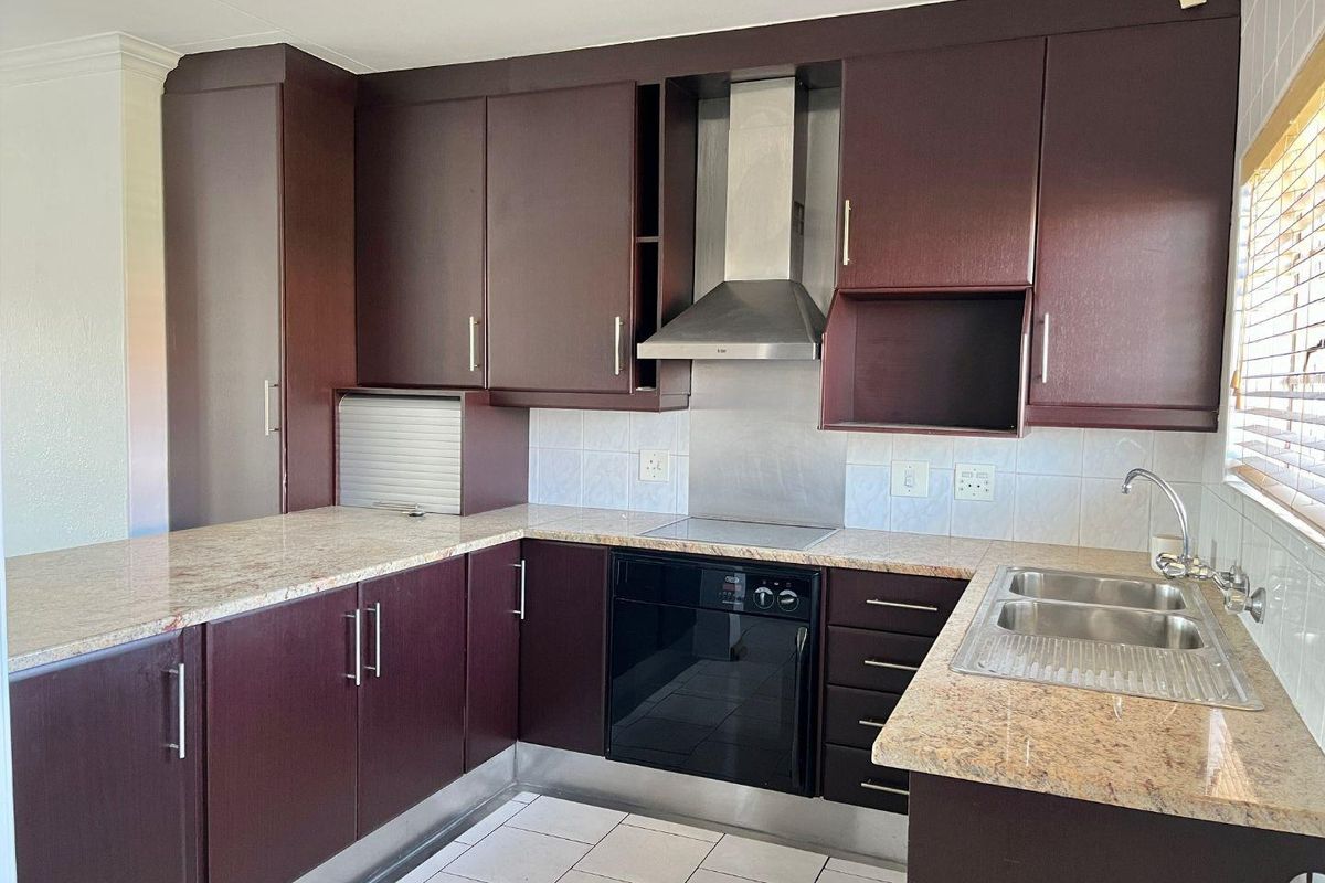 "Modern Two-Bedroom Flat Awaits: Secure, Stylish, and Move-In Ready - Photo 2