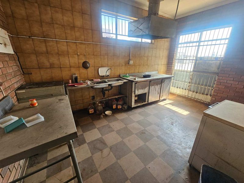 Versatile Commercial Property with Retail and Warehouse Buildings and Cold Storage - Photo 8