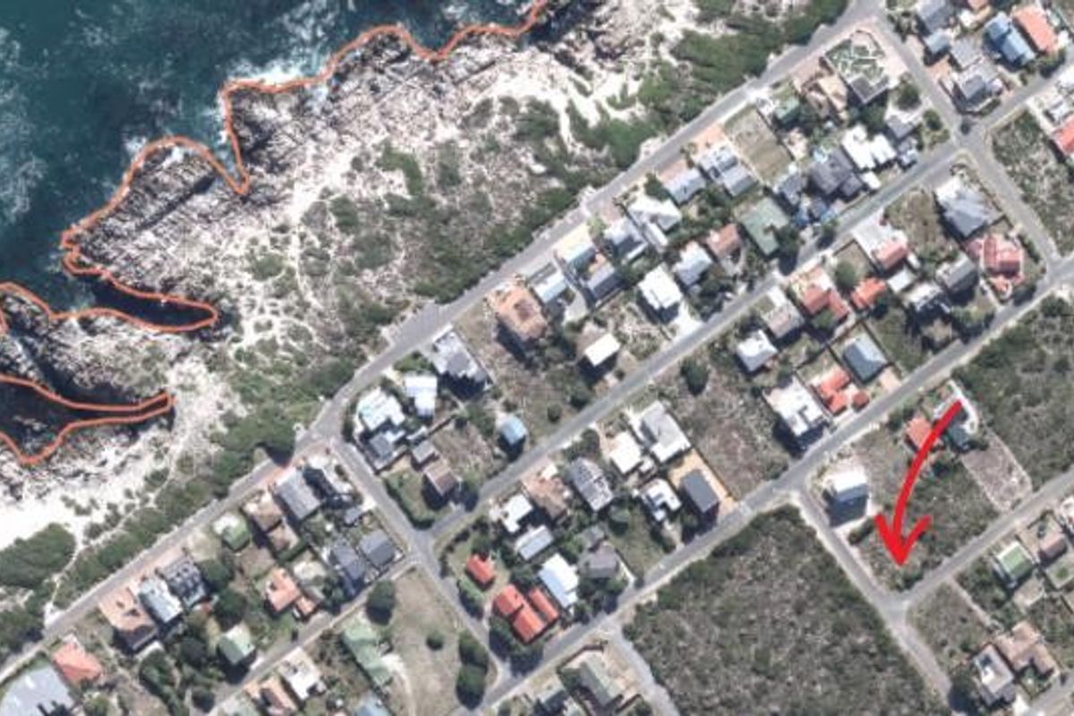 Aerial view of a coastal residential neighborhood showing the property location relative to the rocky shoreline and surrounding street layout.