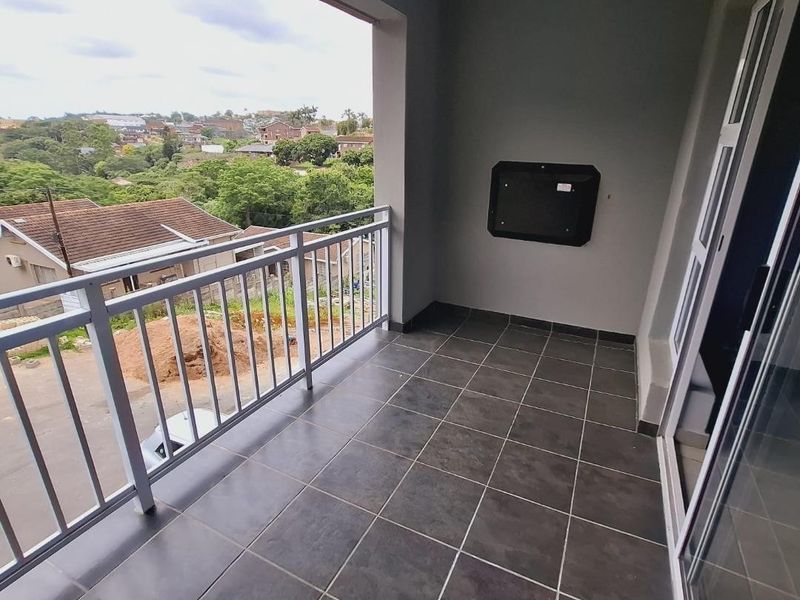 Relaxed Living in Umhlatuzana: Modern 2-Bed Home with Patio! - Photo 1