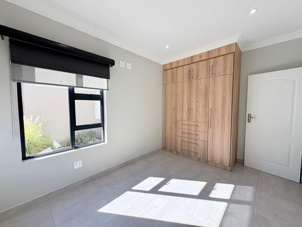 First bedroom with en suite bathroom.