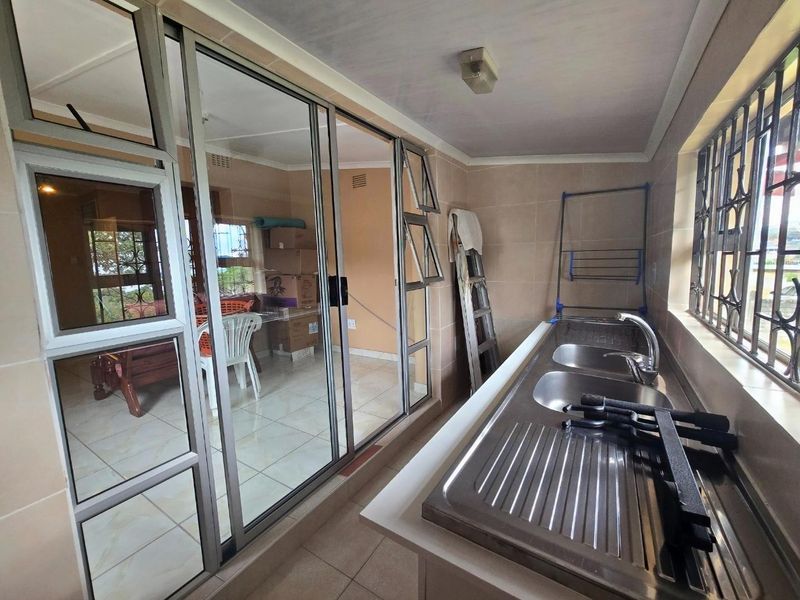 Spacious Four-Bedroom Family Home with potential Flatlet and Scenic Views - Photo 7