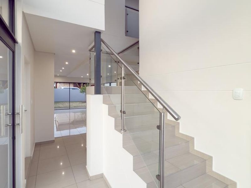 Modern Architectural Gem with Versatile Living & Expansive Balcony in Midstream Meadows - Photo 9