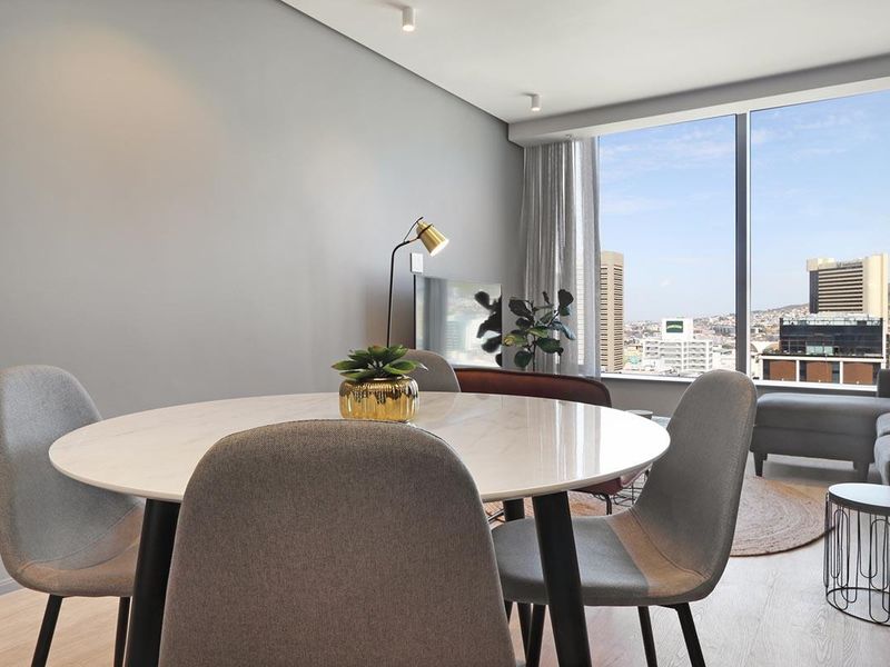 Experience City Living with a Serene Mountain Backdrop - Photo 4